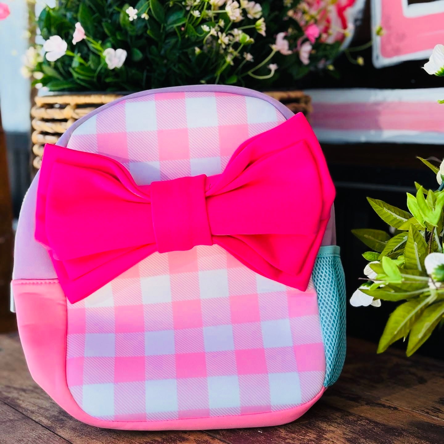 bow neoprene backpack