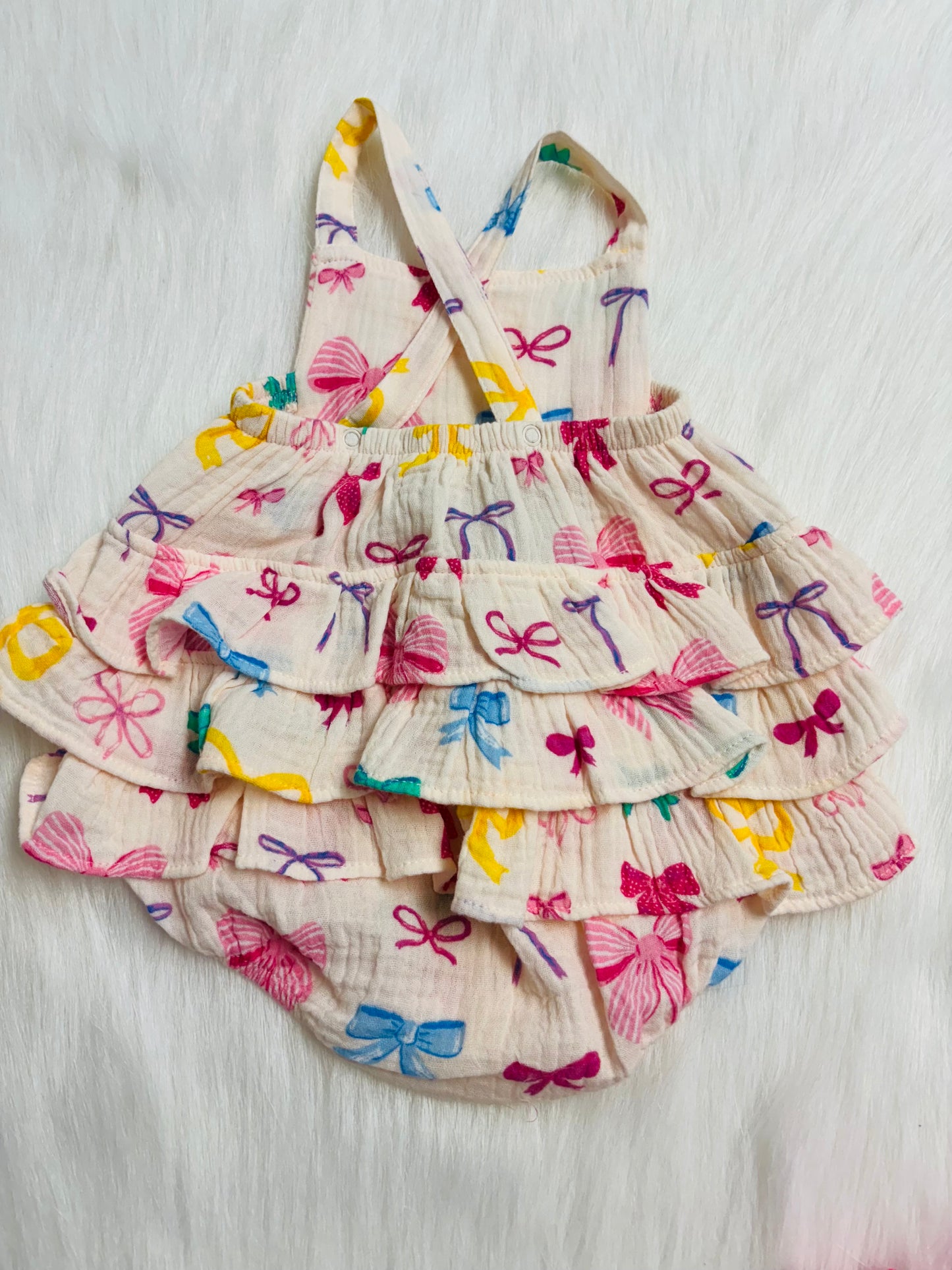 Colorful bows ruffle sunsuit
