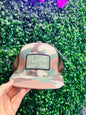 Boy sportsman Trucker hat properly tied